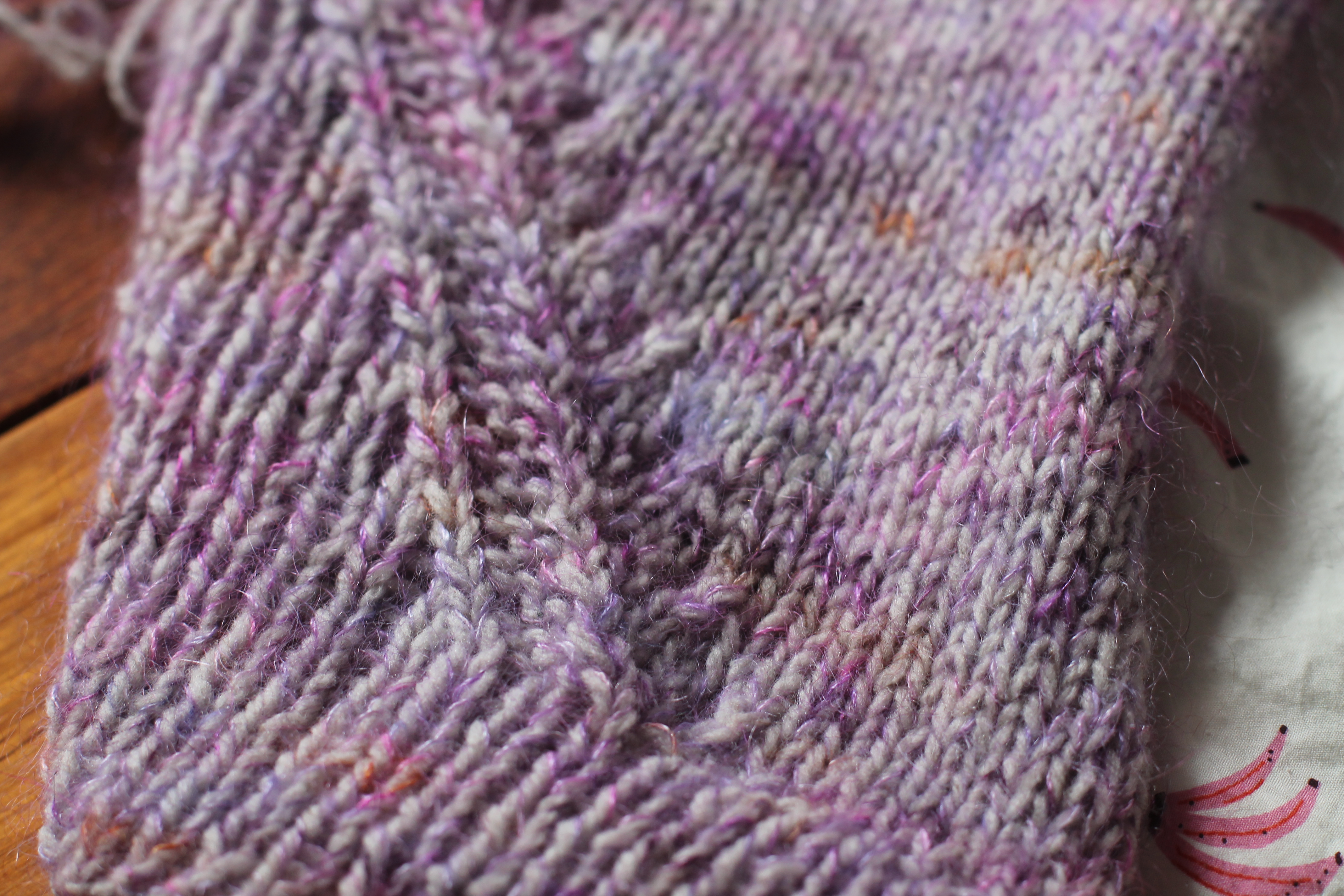 knit eyelet detail of the cardigan 